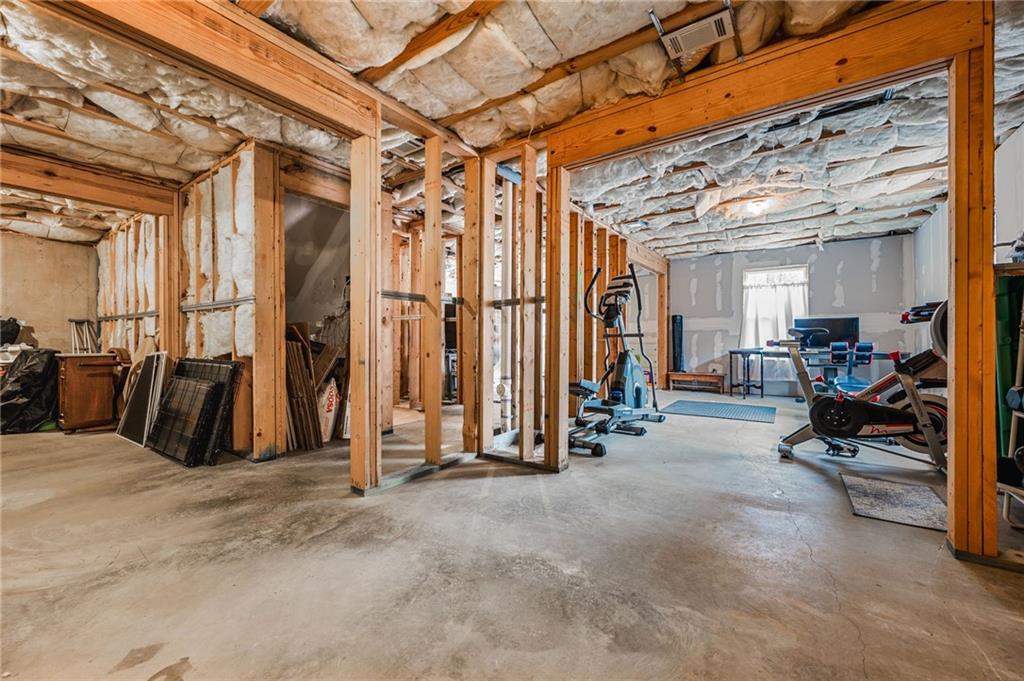 1122 Flagstone Way Acworth, GA 30101 - Photo 39 of 49 a view of a room with gym equipment