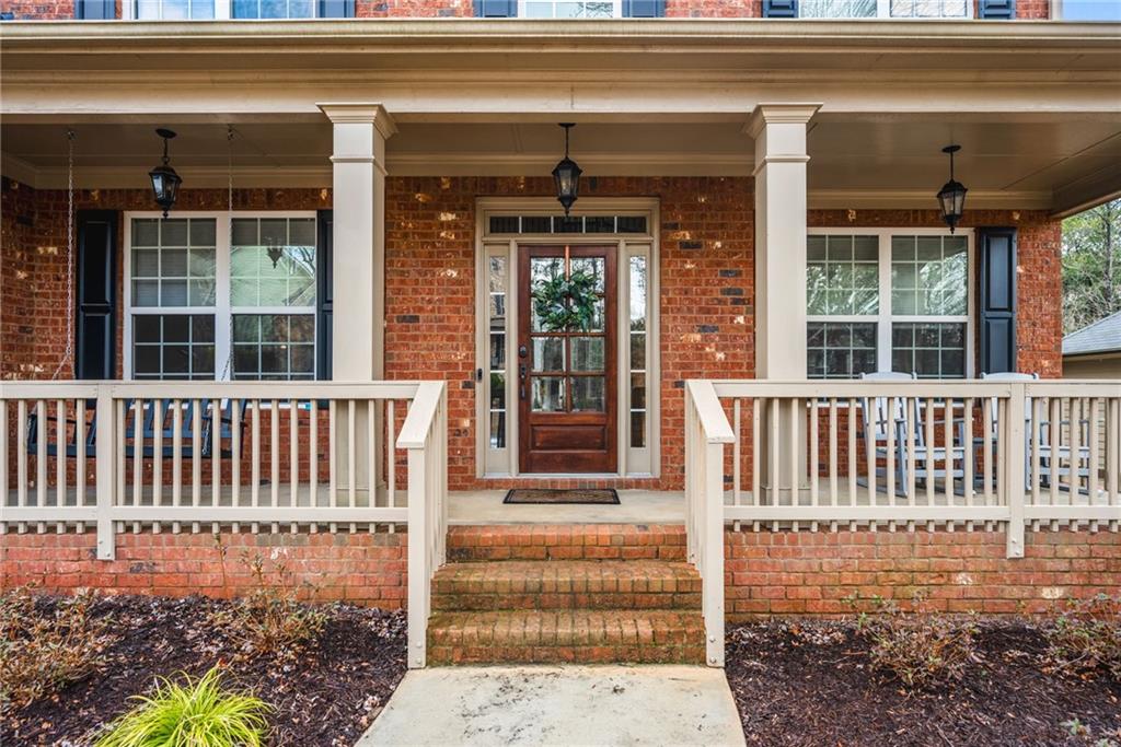 1122 Flagstone Way Acworth, GA 30101 - Photo 4 of 50 a front view of a house with a porch