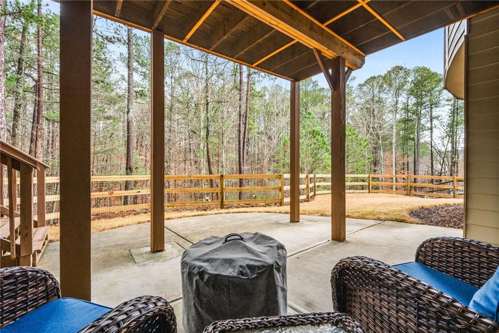 1122 Flagstone Way Acworth, GA 30101 - Photo 45 of 50 a bedroom with furniture and a large window