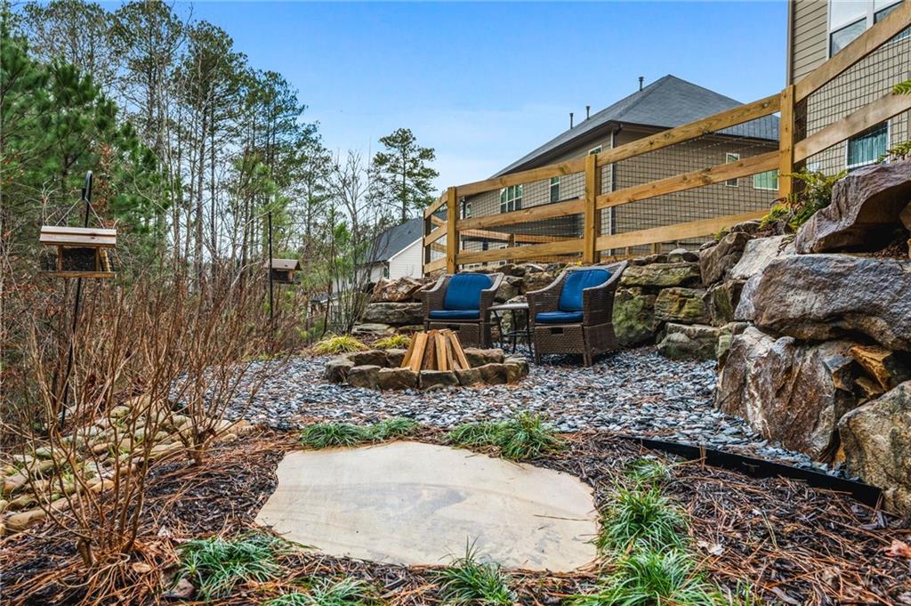 1122 Flagstone Way Acworth, GA 30101 - Photo 46 of 50 a view of backyard with patio