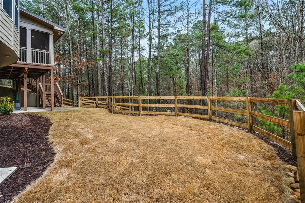 1122 Flagstone Way Acworth, GA 30101 - Photo 50 of 50 a view of outdoor space with deck and trees