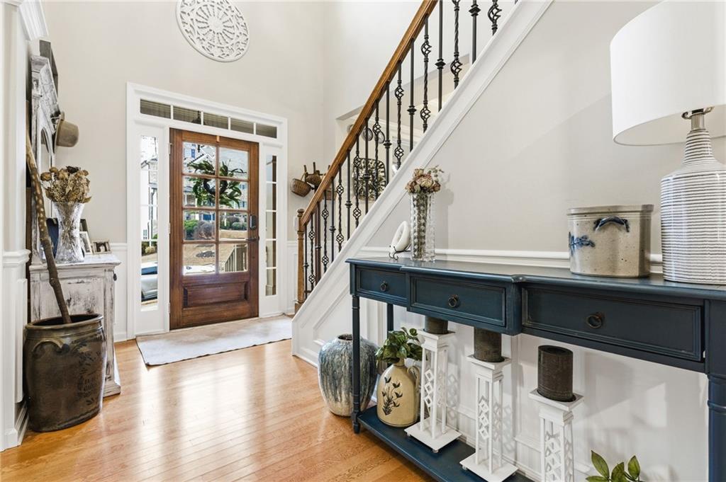 1122 Flagstone Way Acworth, GA 30101 - Photo 5 of 49 a view of entryway and hall with wooden floor