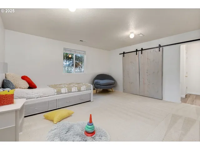 a bedroom with furniture and a bed