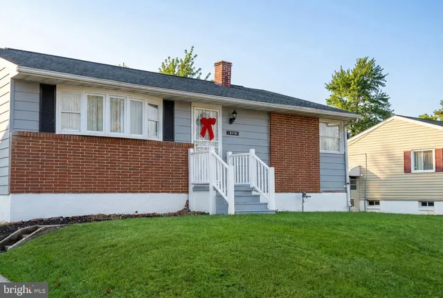 a front view of house with yard