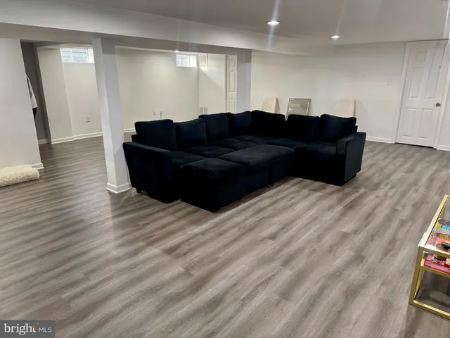 a living room with couch and a table