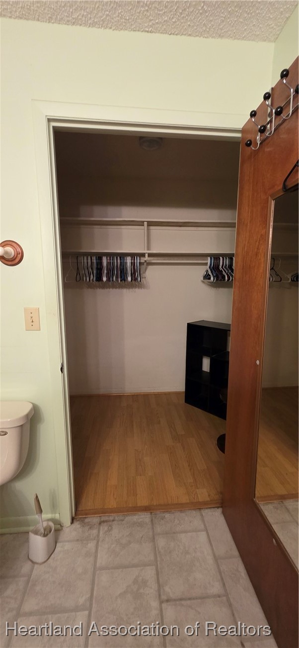 307 Southwest 10th Street Okeechobee, FL 34974 - Photo 19 of 38 Walk-in closet in en-suite