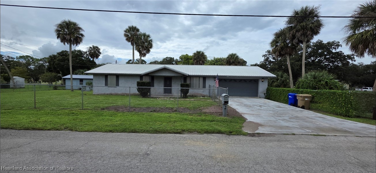 307 Southwest 10th Street Okeechobee, FL 34974 - Photo 2 of 38 Front elevation