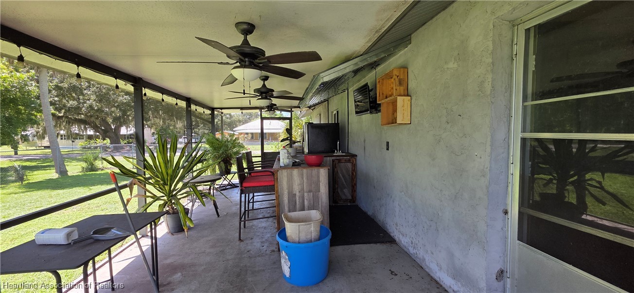307 Southwest 10th Street Okeechobee, FL 34974 - Photo 32 of 38 screen porch