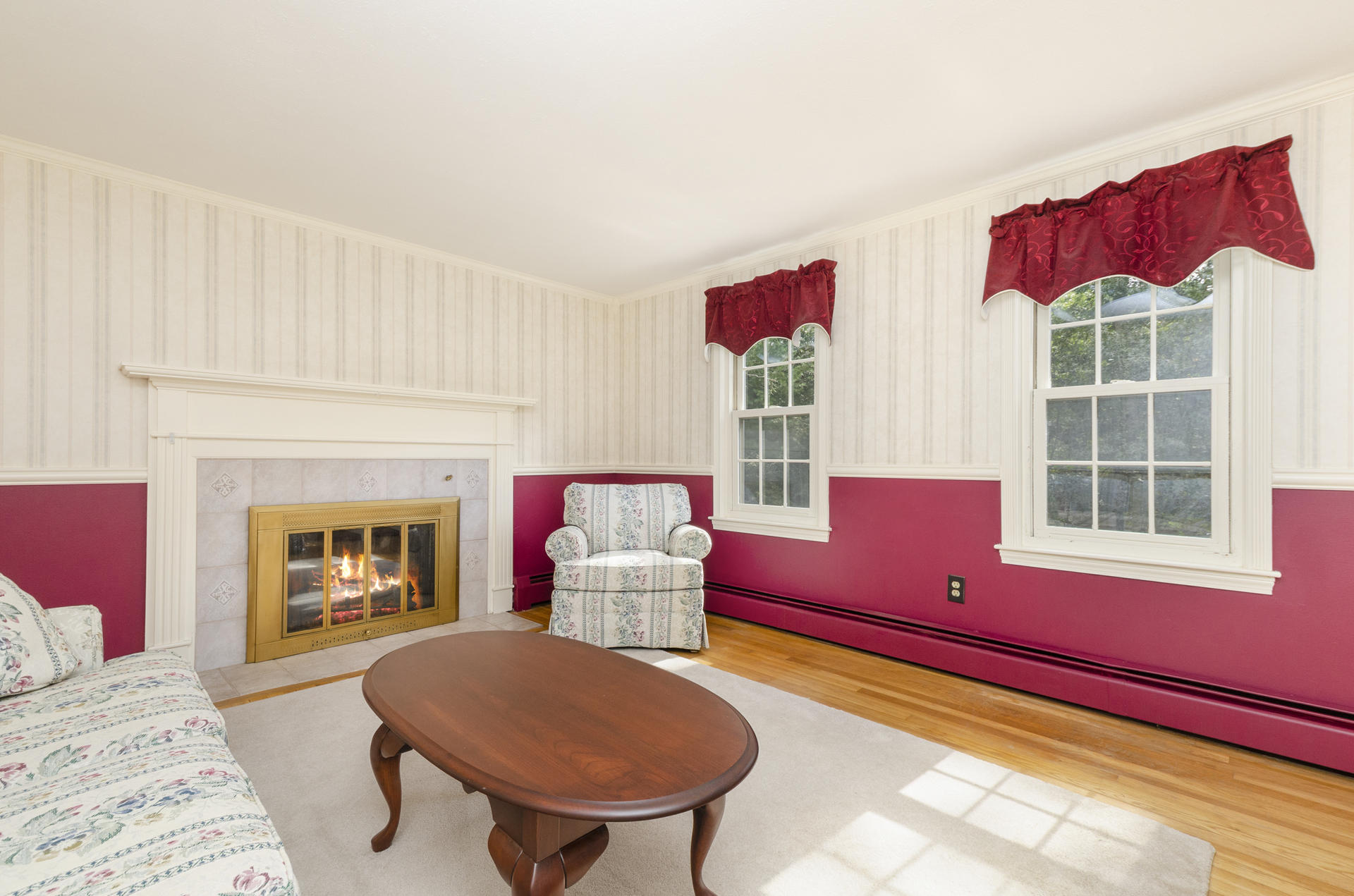 236 Old Mill Road Marstons Mills, MA 02648 - Photo 13 of 20 a living room with furniture and a fireplace
