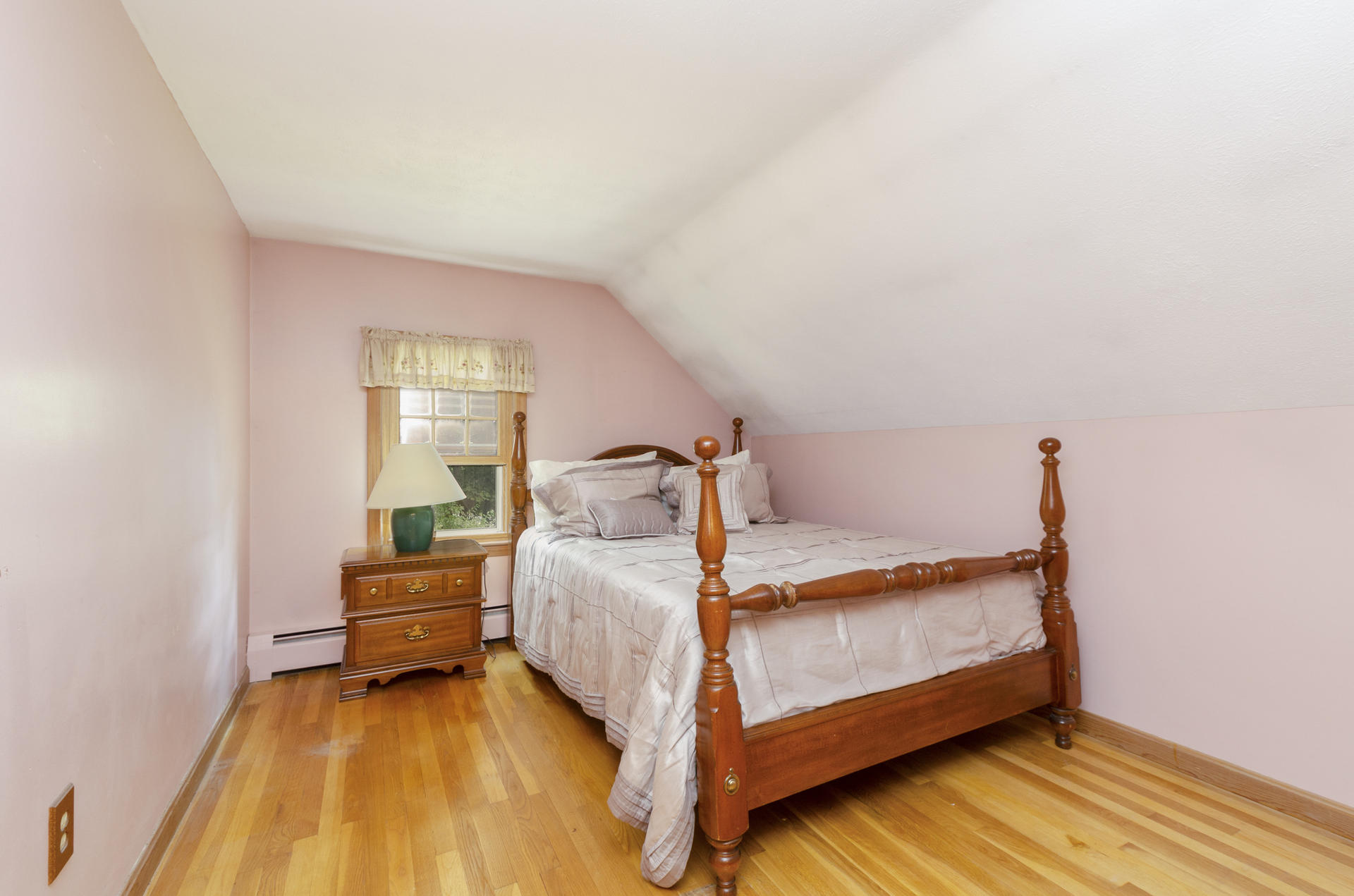 236 Old Mill Road Marstons Mills, MA 02648 - Photo 18 of 20 a bed sitting in a bedroom next to a window