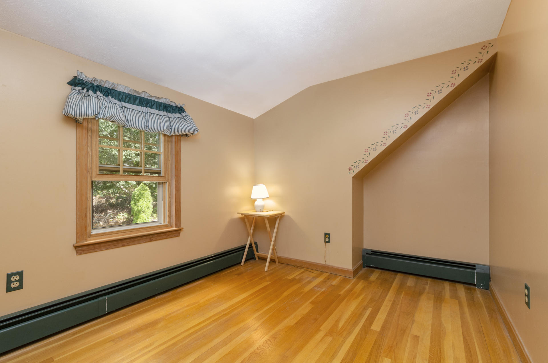 236 Old Mill Road Marstons Mills, MA 02648 - Photo 19 of 20 a view of a room with wooden floor and a window