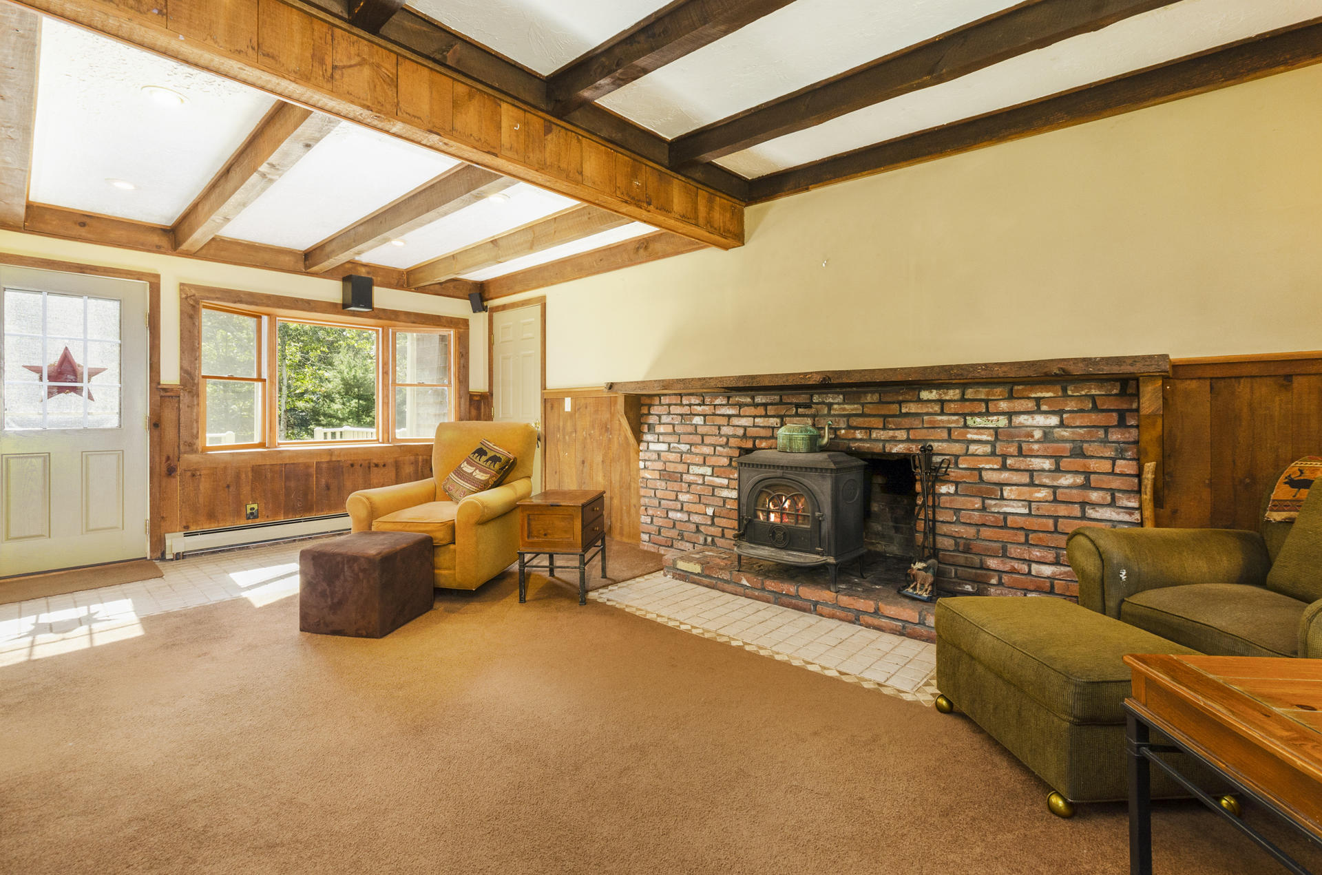 236 Old Mill Road Marstons Mills, MA 02648 - Photo 7 of 20 a living room with furniture and a fireplace