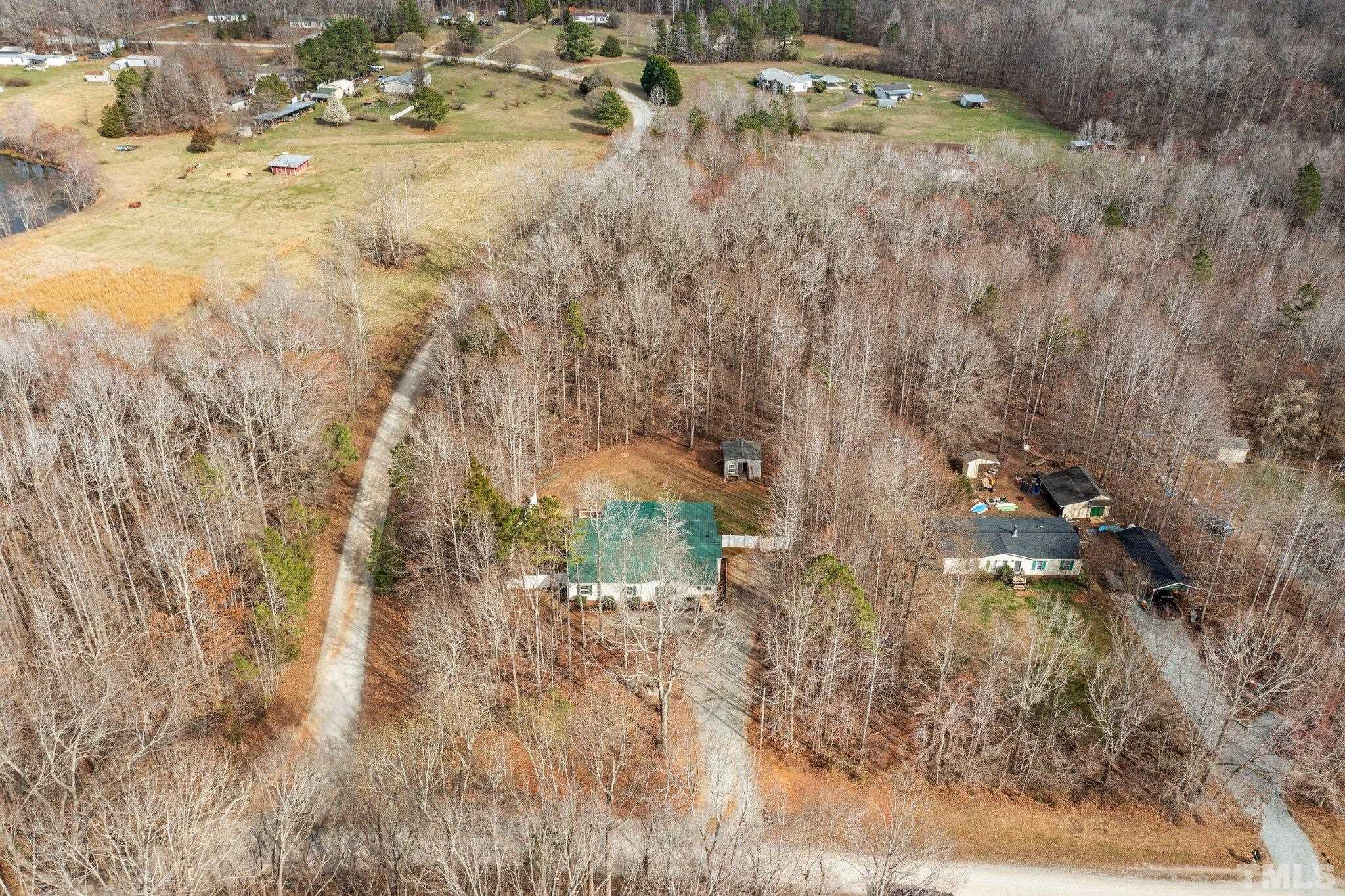 199 New Chestnut Drive Rougemont, NC 27572 - Photo 2 of 28 a view of swimming pool and mountain in the background