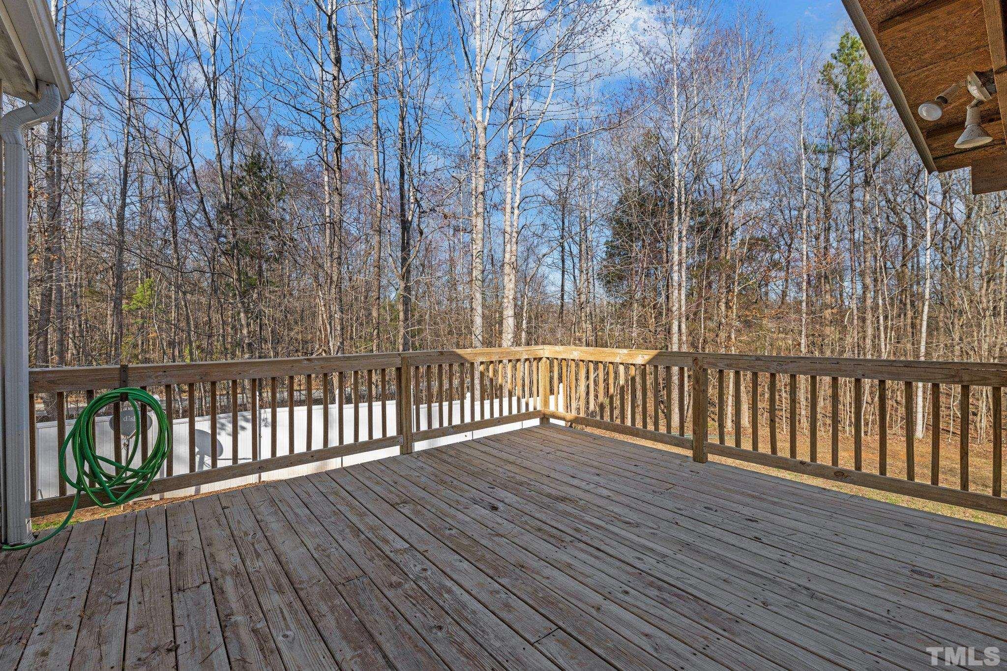 199 New Chestnut Drive Rougemont, NC 27572 - Photo 23 of 28 a view of deck with wooden floor and fence