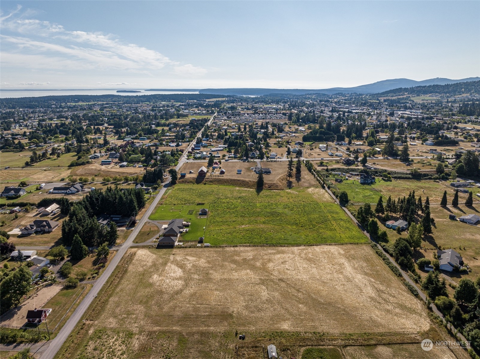 1575 West Hendrickson Road Sequim, WA 98382 - Photo 5 of 16 an aerial view of a