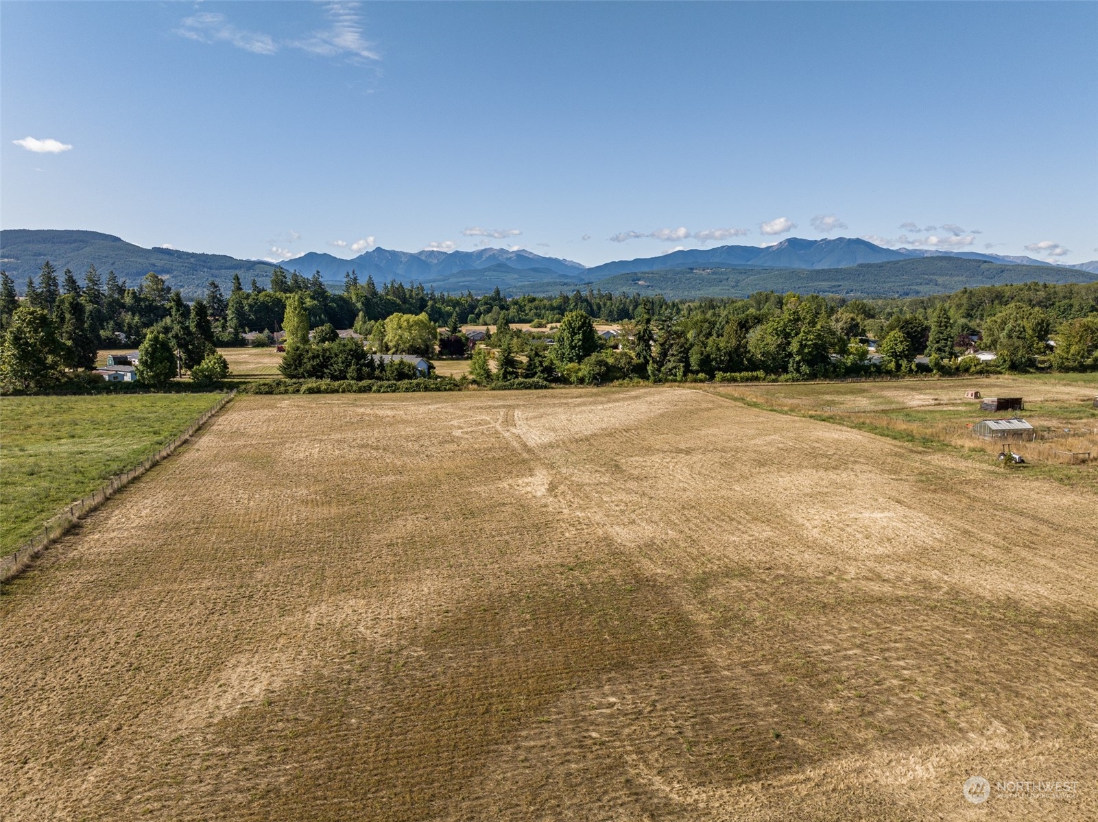 1575 West Hendrickson Road Sequim, WA 98382 - Photo 9 of 16 a view of an outdoor space and a mountain view