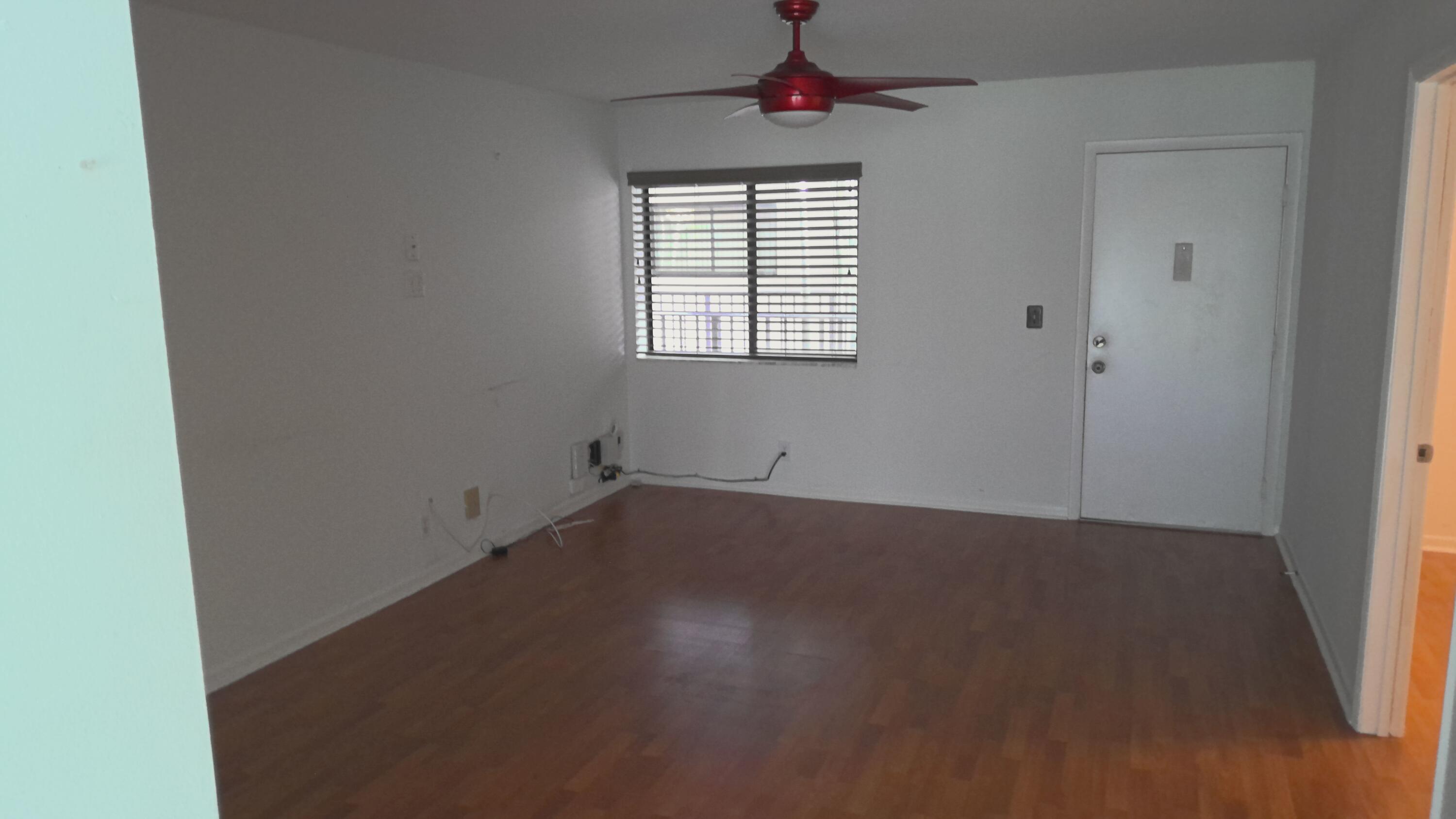 5130 Las Verdes Circle, Unit 214 Delray Beach, FL 33484 - Photo 5 of 22 livingroom