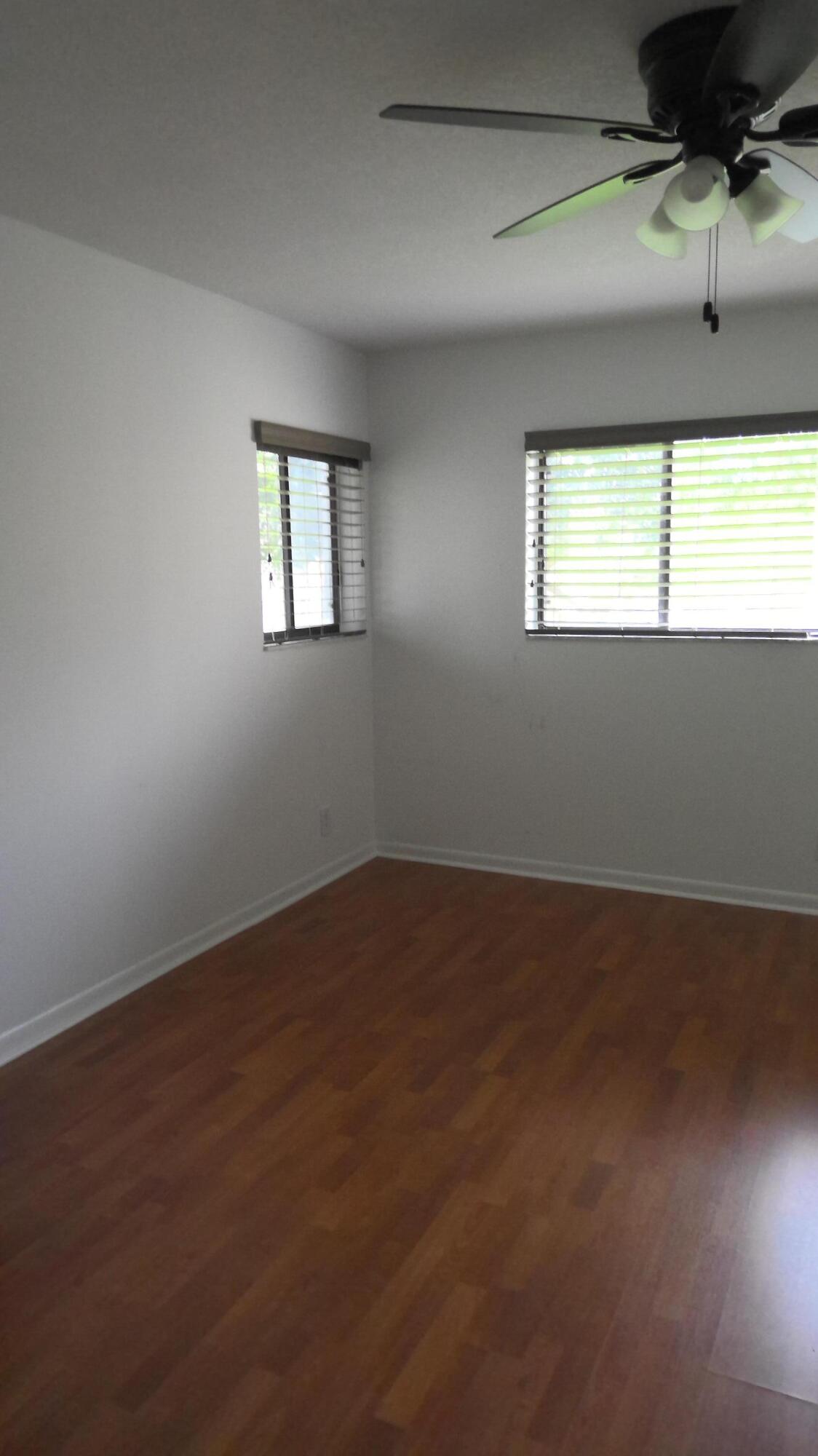 5130 Las Verdes Circle, Unit 214 Delray Beach, FL 33484 - Photo 7 of 22 masterbed1