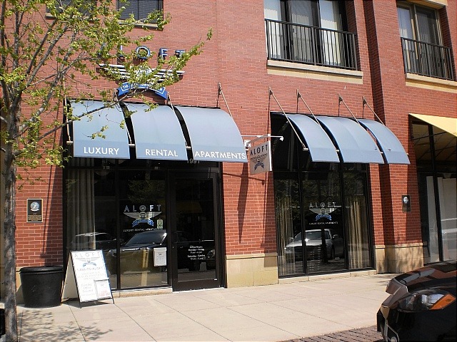 a view of a house with door and windows