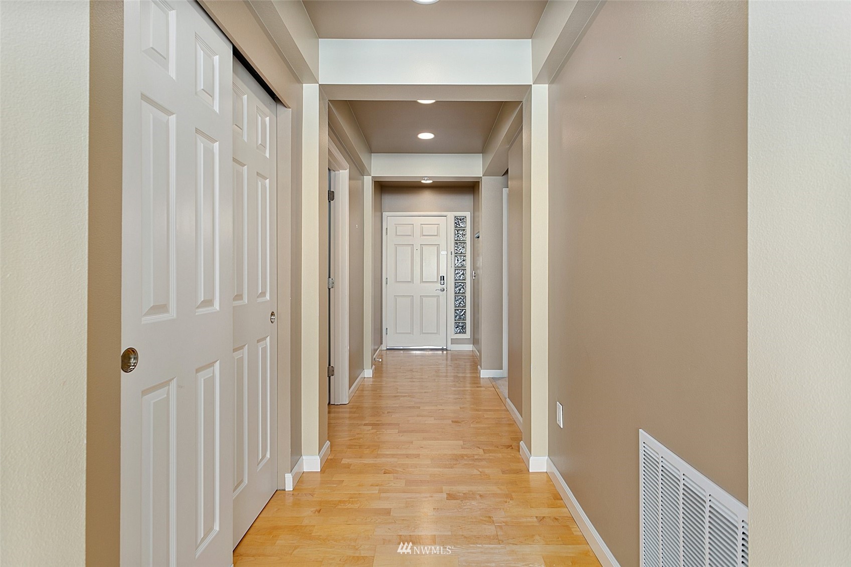 102 State Street, Unit 101W Kirkland, WA 98033 - Photo 17 of 38 a view of hallway with wooden floor