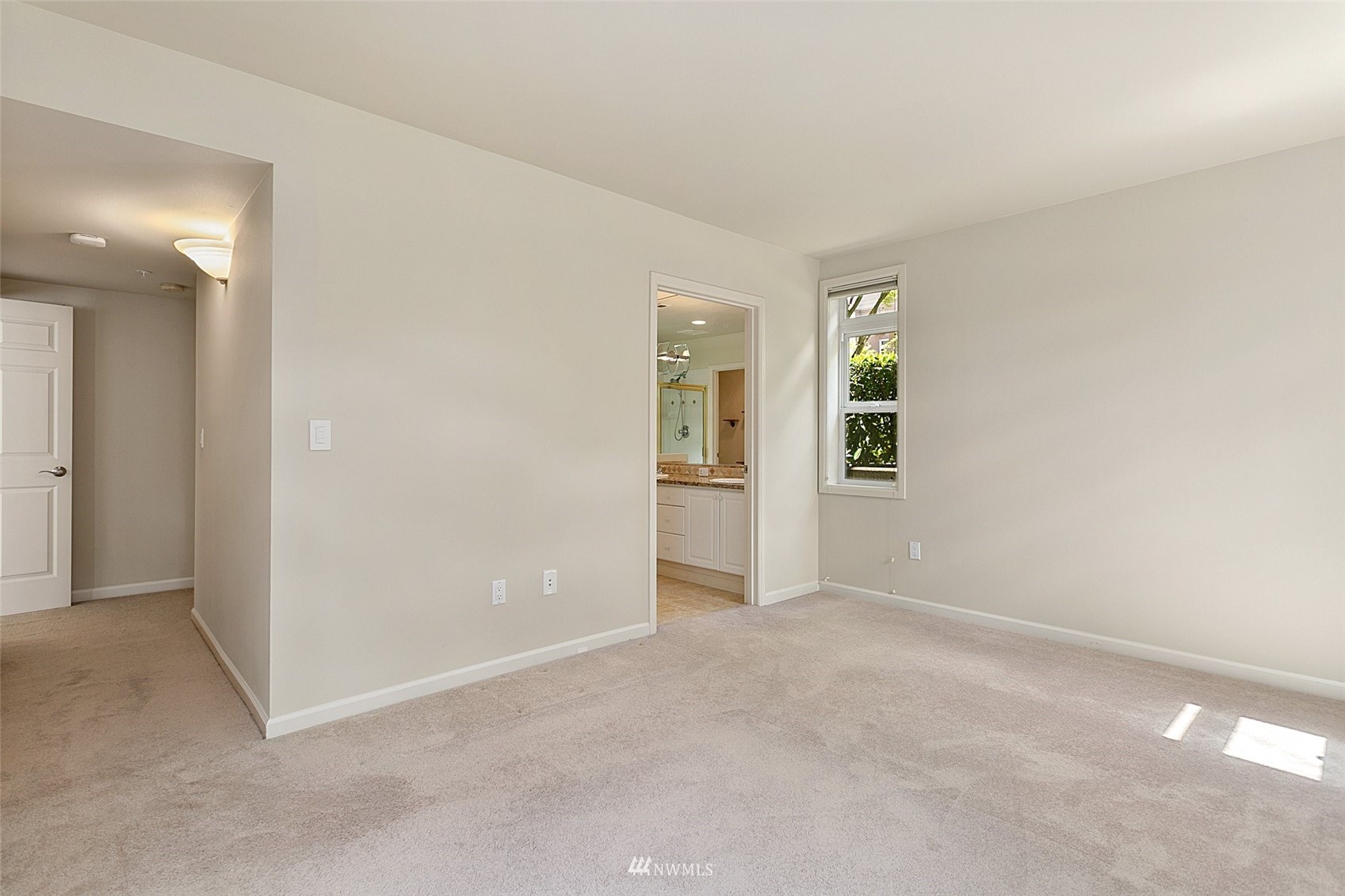 102 State Street, Unit 101W Kirkland, WA 98033 - Photo 19 of 38 an empty room with windows and closet