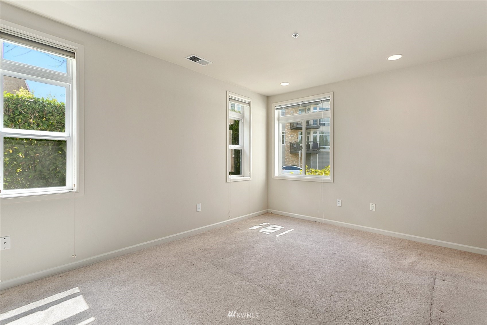 102 State Street, Unit 101W Kirkland, WA 98033 - Photo 20 of 38 a view of an empty room with a window