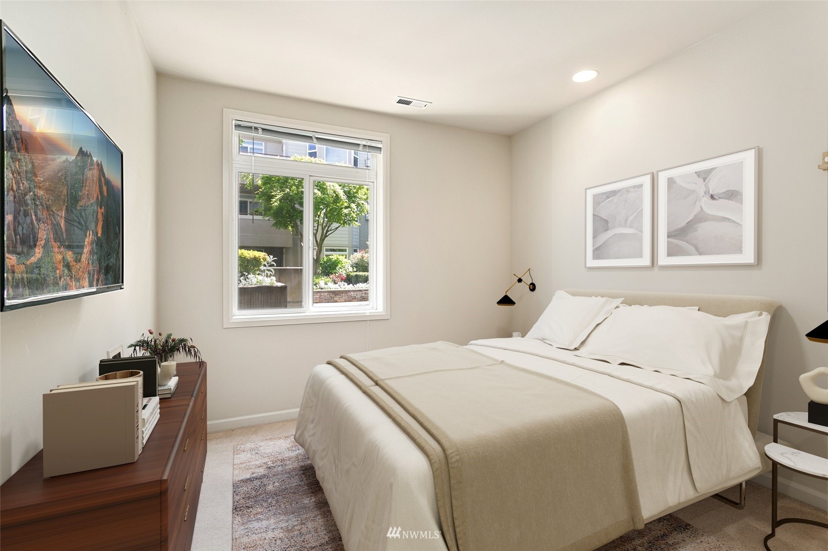 102 State Street, Unit 101W Kirkland, WA 98033 - Photo 23 of 38 a bedroom with a bed and a window