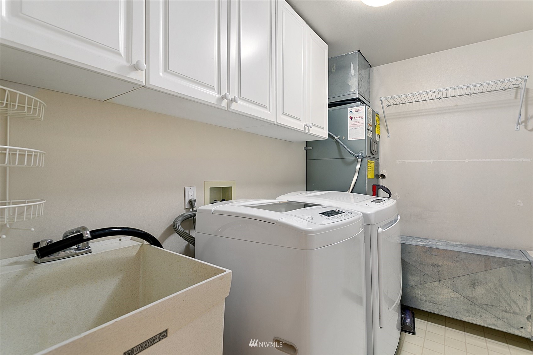 102 State Street, Unit 101W Kirkland, WA 98033 - Photo 26 of 38 a utility room with dryer and washer
