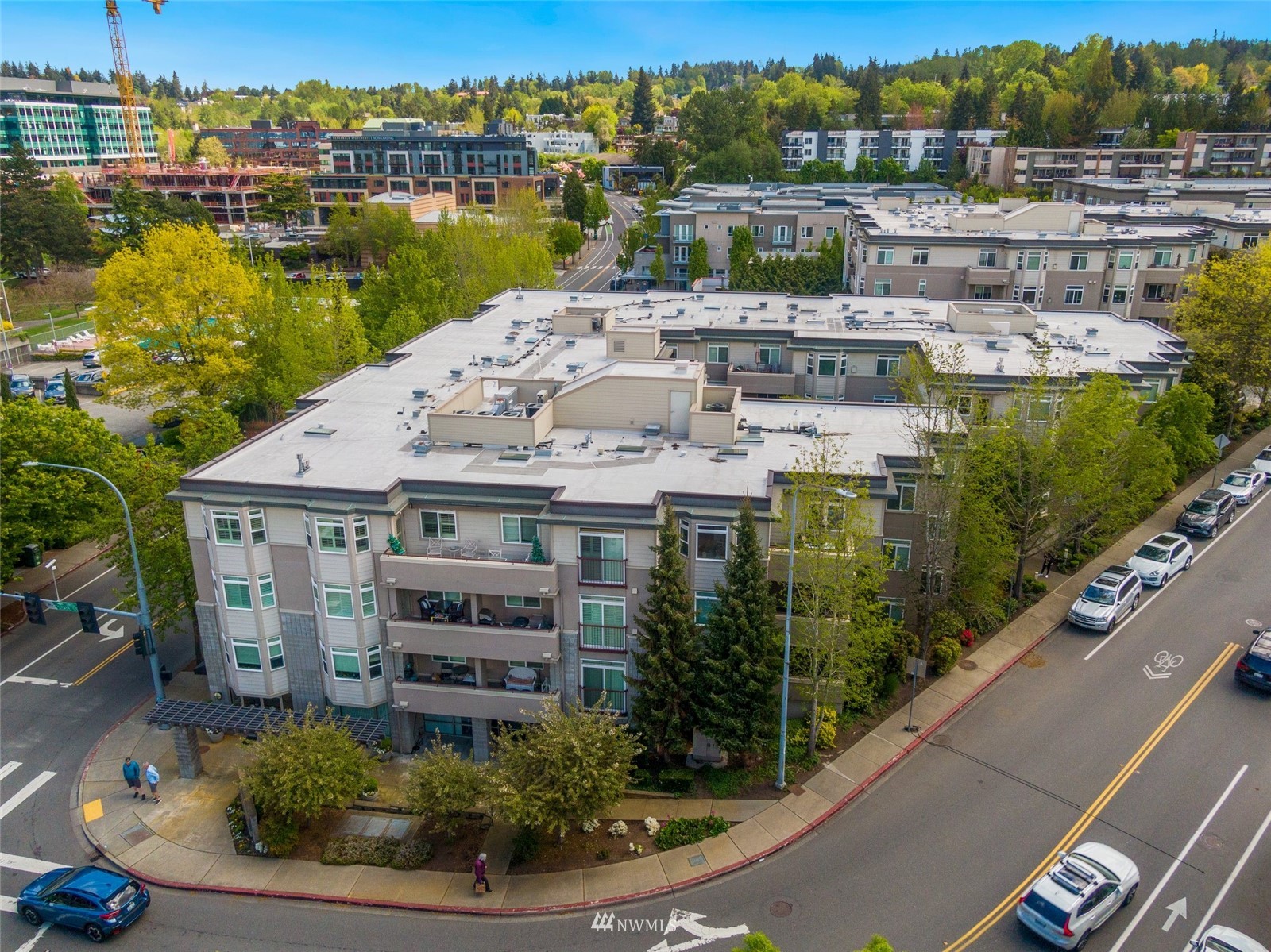 102 State Street, Unit 101W Kirkland, WA 98033 - Photo 30 of 38 a view of a lake with a building in the background