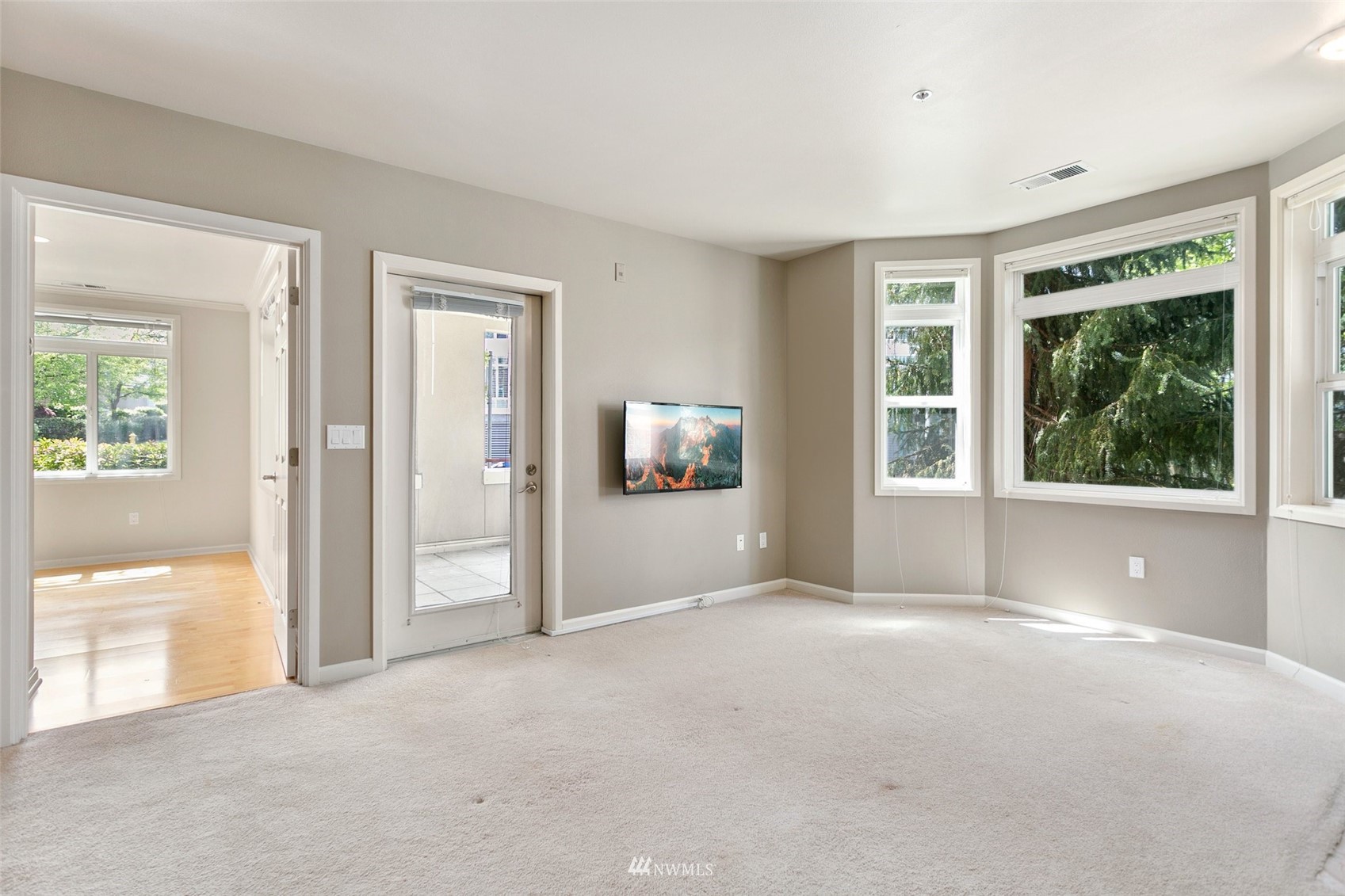 102 State Street, Unit 101W Kirkland, WA 98033 - Photo 8 of 38 a view of an empty room with a window