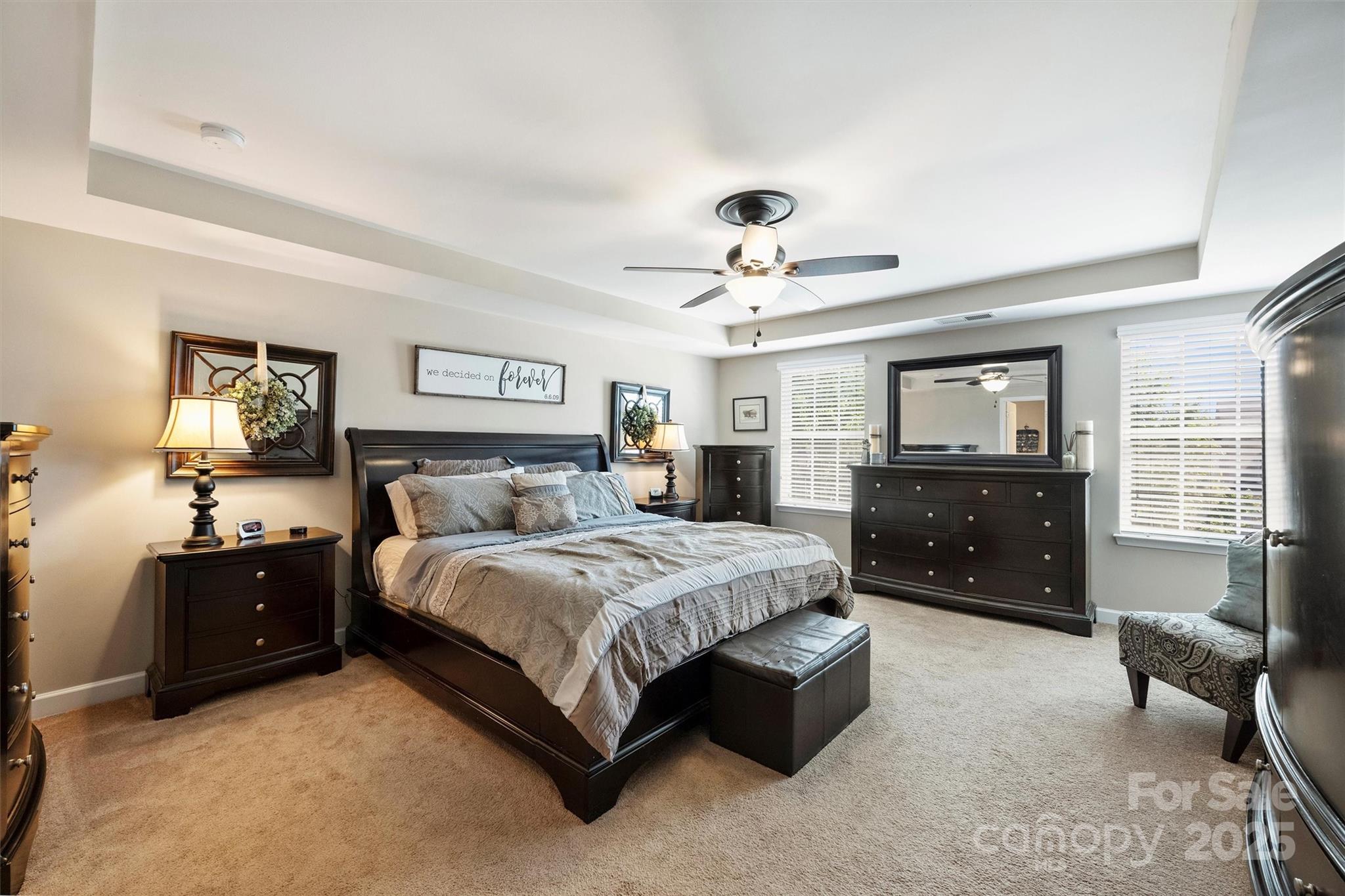 79115 Ridgehaven Road Lancaster, SC 29720 - Photo 23 of 47 a spacious bedroom with a bed and lamp on dresser