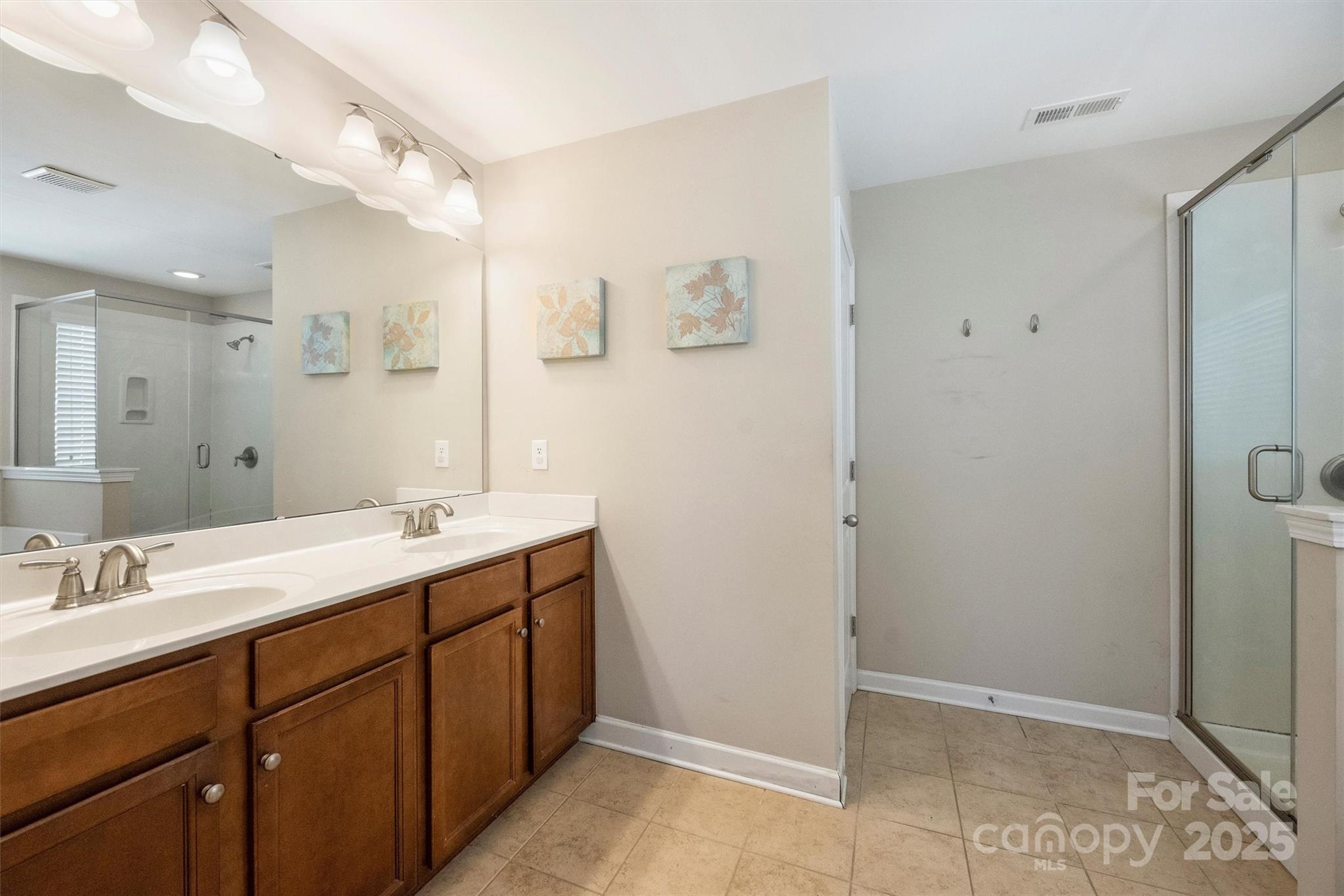 79115 Ridgehaven Road Lancaster, SC 29720 - Photo 25 of 47 a spacious bathroom with a double vanity sink mirror and double