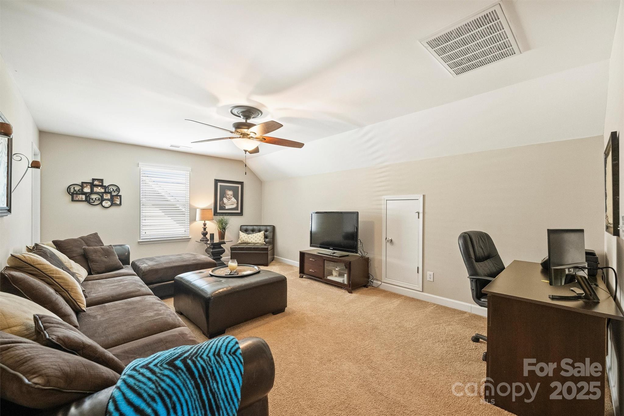 79115 Ridgehaven Road Lancaster, SC 29720 - Photo 34 of 47 a living room with furniture a flat screen tv and a window