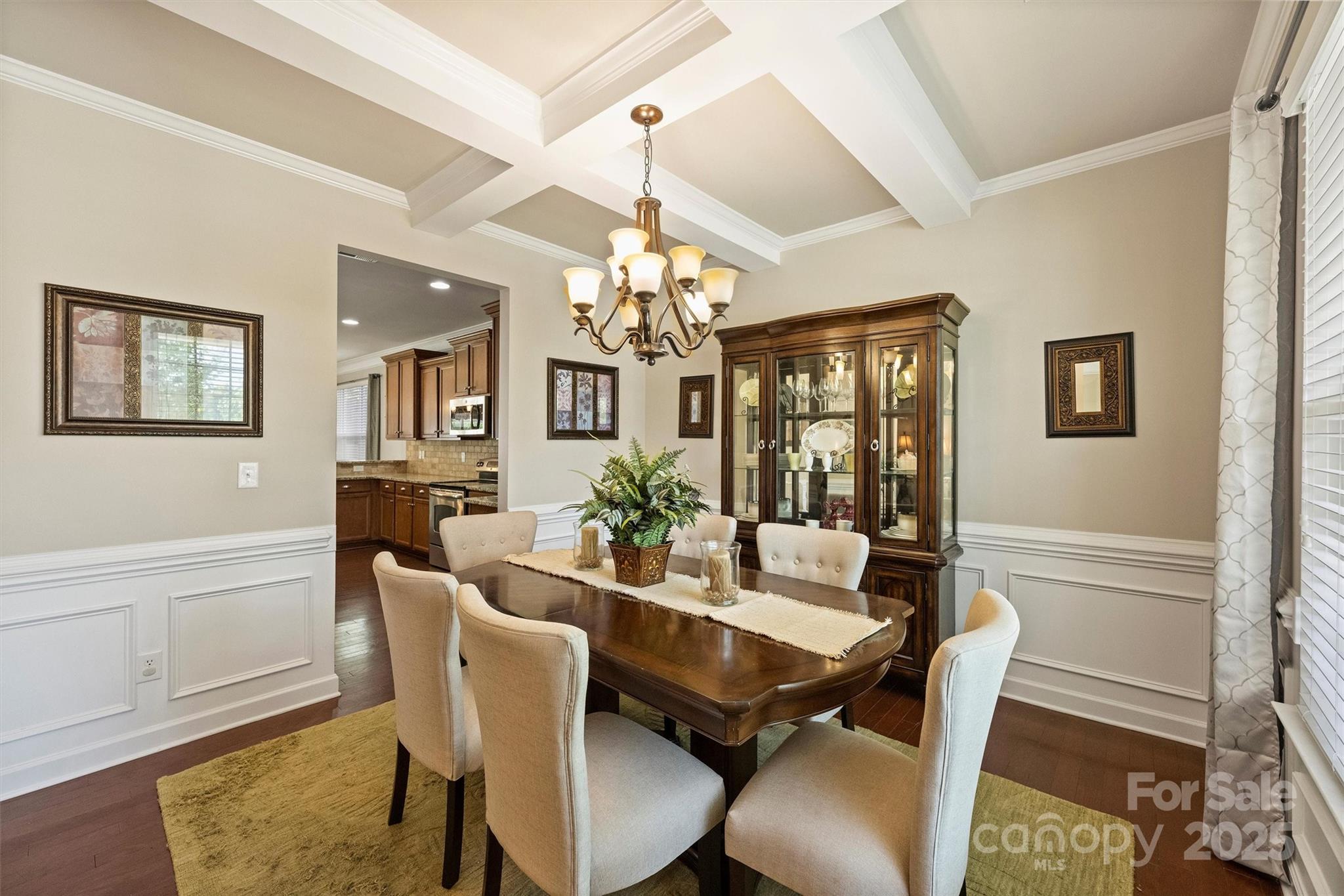 79115 Ridgehaven Road Lancaster, SC 29720 - Photo 8 of 47 a view of a dining room with furniture wooden floor and chandelier