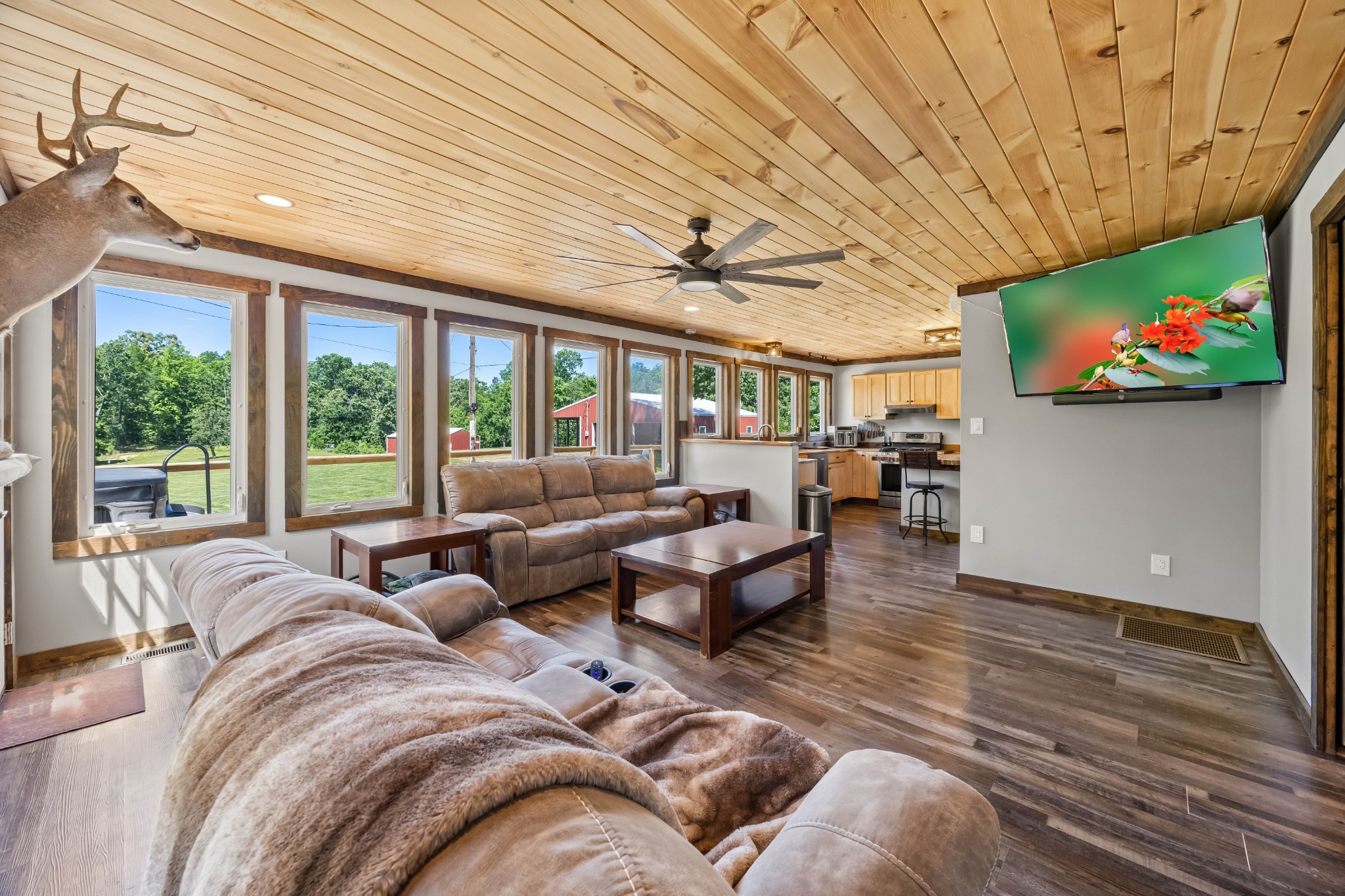 326 Hargis Road Bumpus Mills, TN 37028 - Photo 20 of 67 a living room with furniture and a flat screen tv