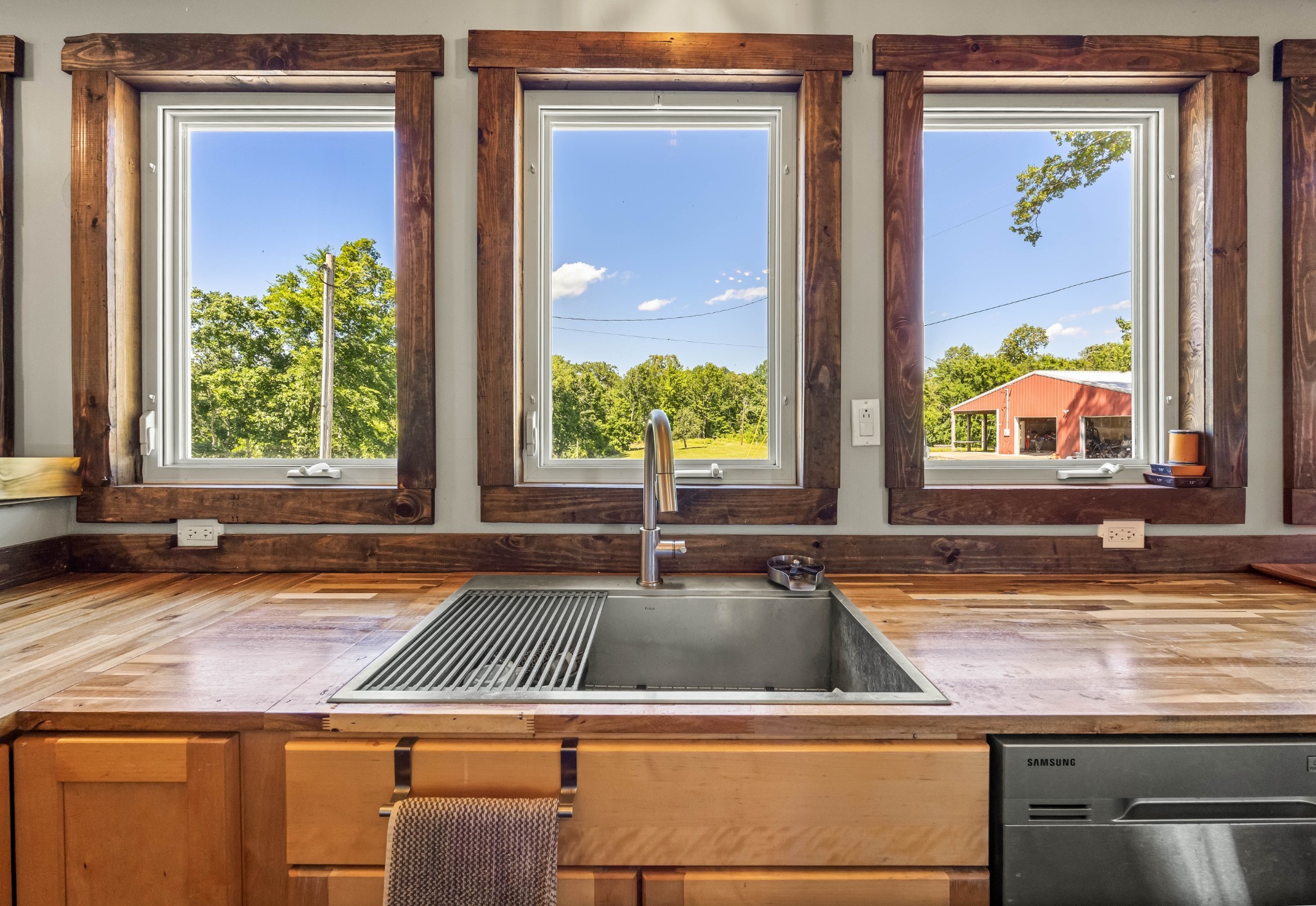 326 Hargis Road Bumpus Mills, TN 37028 - Photo 24 of 67 a kitchen sink with a granite countertop window and a sink