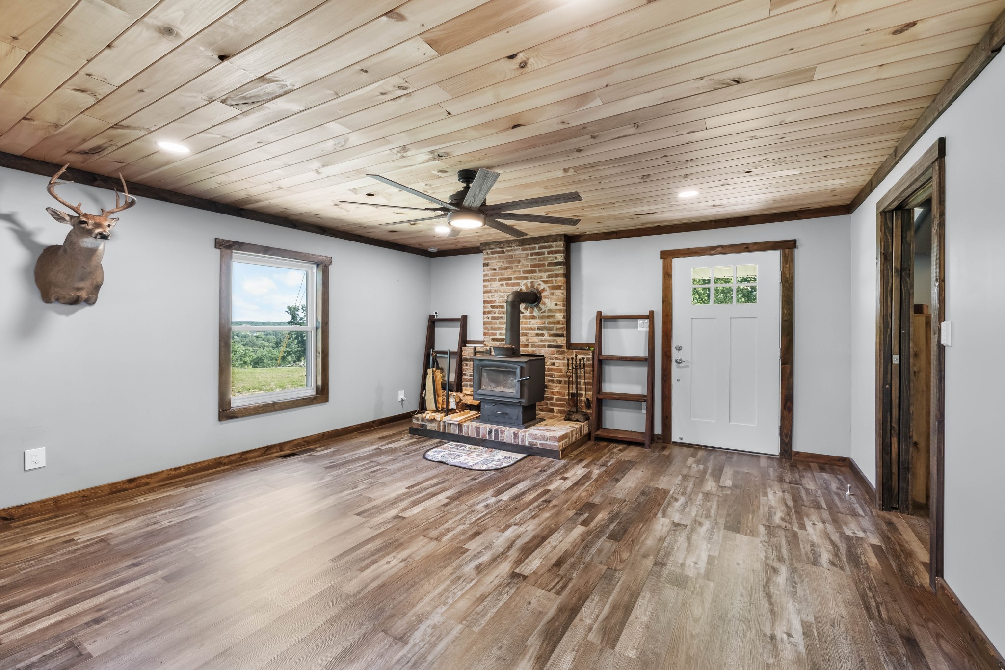 326 Hargis Road Bumpus Mills, TN 37028 - Photo 38 of 67 a view of a livingroom with furniture and hardwood floor