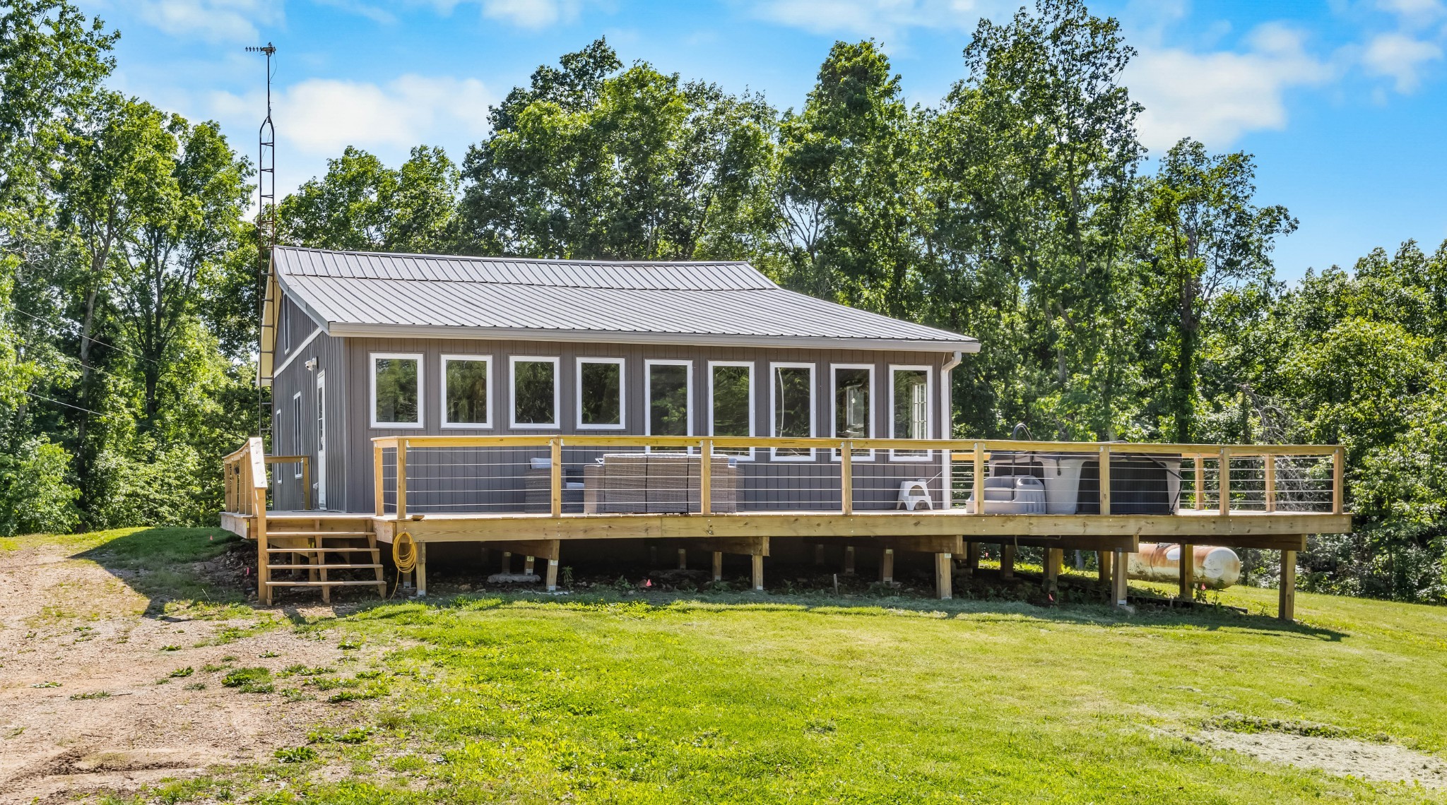 326 Hargis Road Bumpus Mills, TN 37028 - Photo 65 of 67 a house view with a swimming pool and sitting space