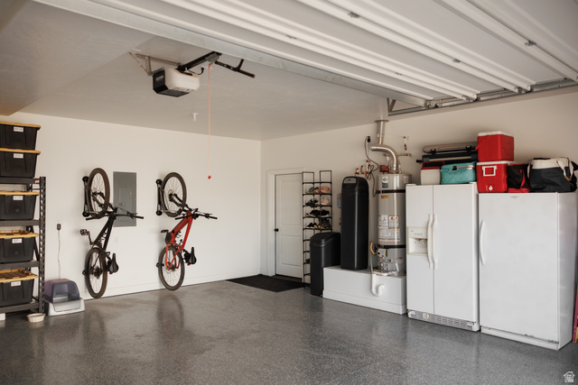 629 Spring Lily Drive St. George, UT 84790 - Photo 46 of 50 Spacious garage featuring a durable epoxy floor coating and bright overhead lighting