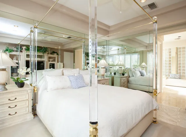 a living room with furniture and view of kitchen