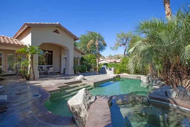 a view of a house with entertaining space