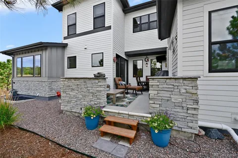 a view of a patio with potted plants