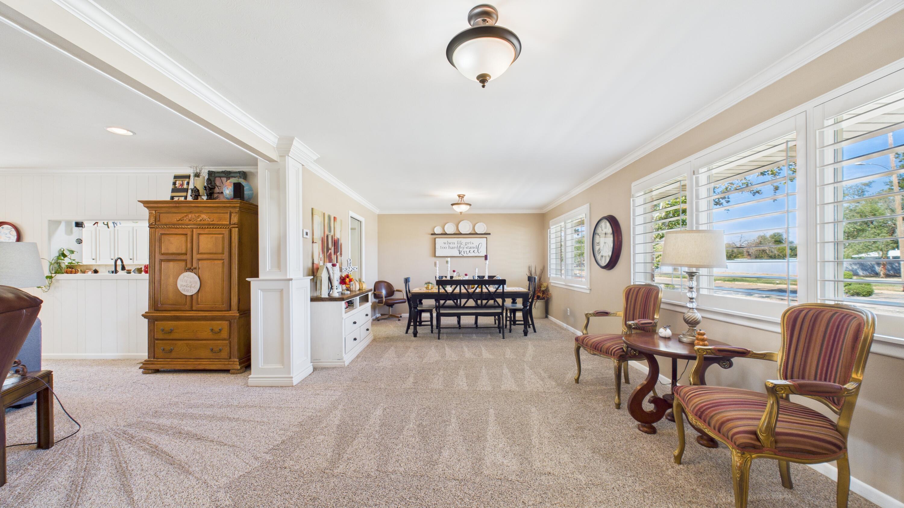 609 North 21st Street Lamesa, TX 79331 - Photo 25 of 50 a living room with furniture and a large window