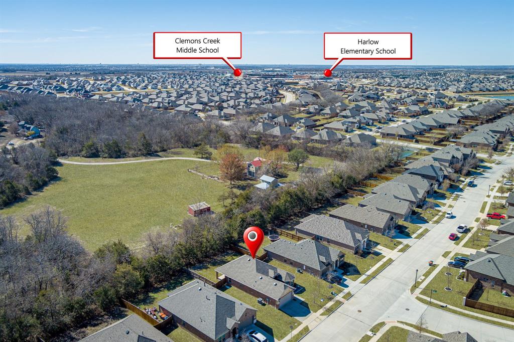 1500 Elizabeth Street Anna, TX 75409 - Photo 20 of 25 an aerial view of a house with a lake view