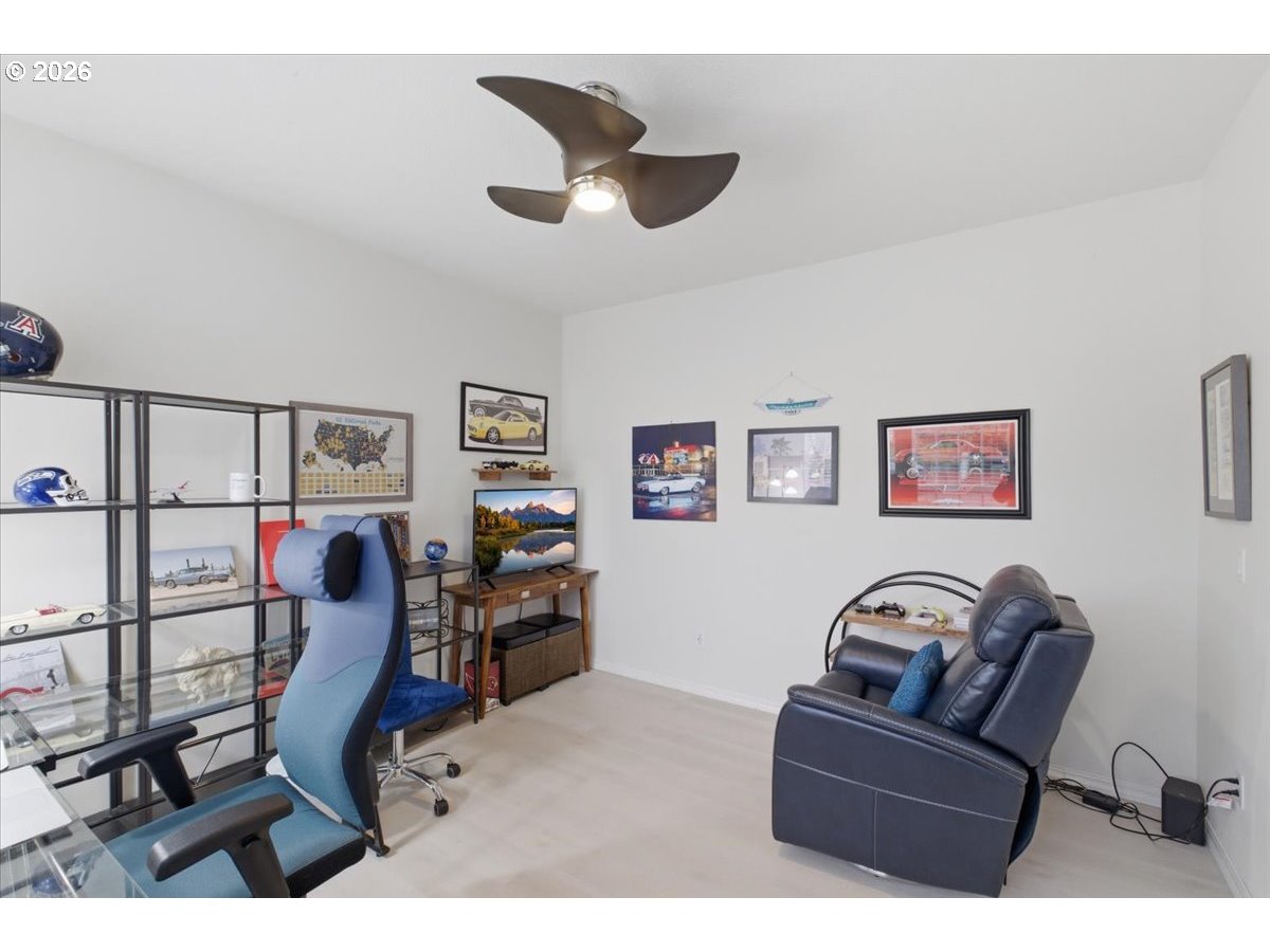 2469 Dalke Ridge Drive Northwest Salem, OR 97304 - Photo 22 of 42 a view of a livingroom with furniture and a couch