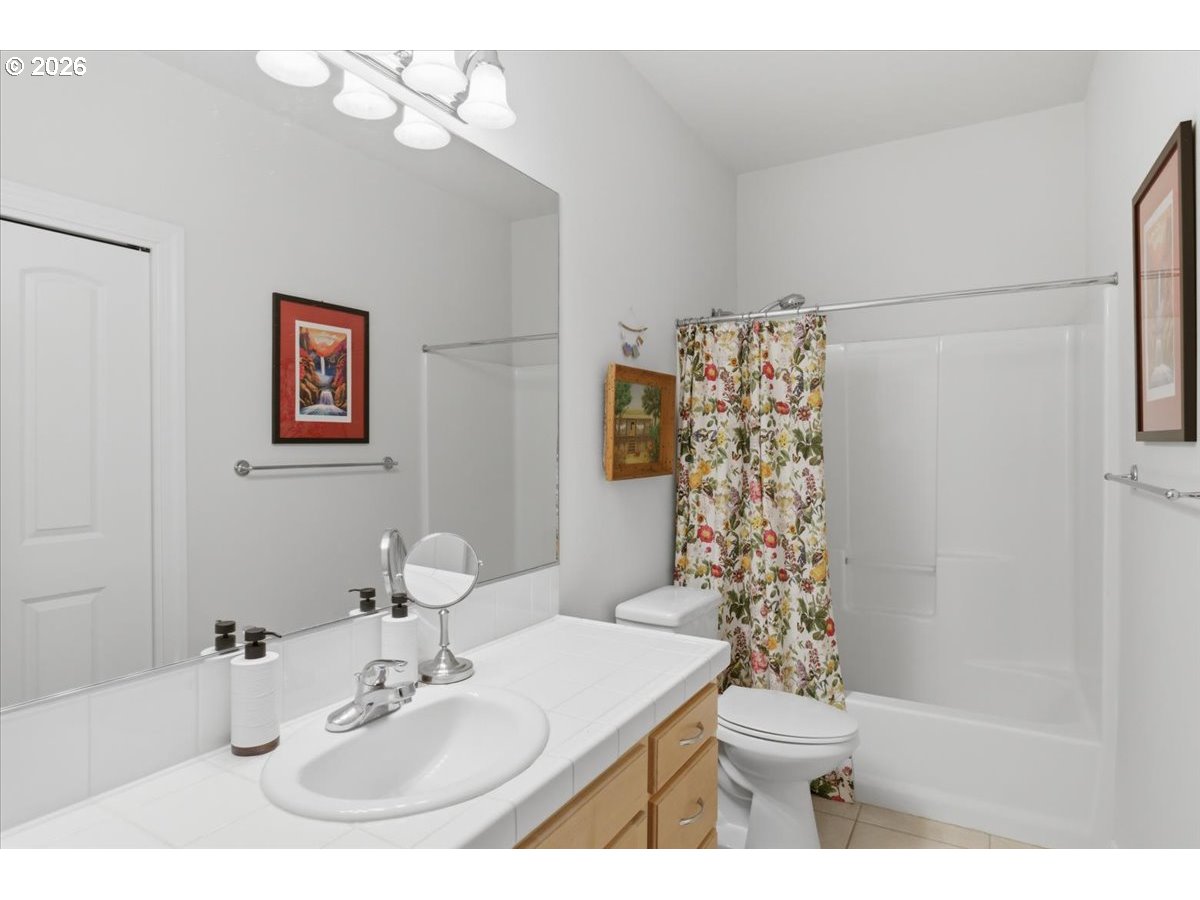 2469 Dalke Ridge Drive Northwest Salem, OR 97304 - Photo 32 of 42 a bathroom with a sink toilet and shower
