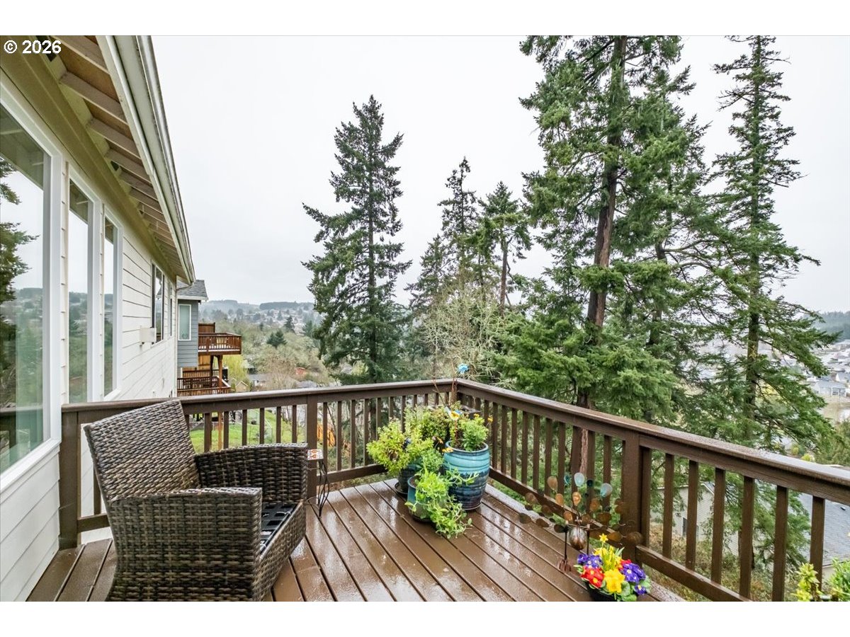 2469 Dalke Ridge Drive Northwest Salem, OR 97304 - Photo 41 of 42 a view of balcony with wooden floor and seating space