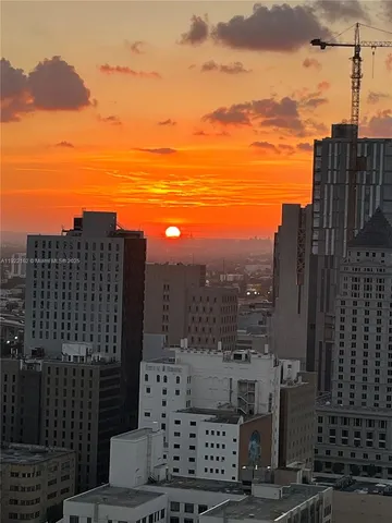 a view of a city with tall buildings
