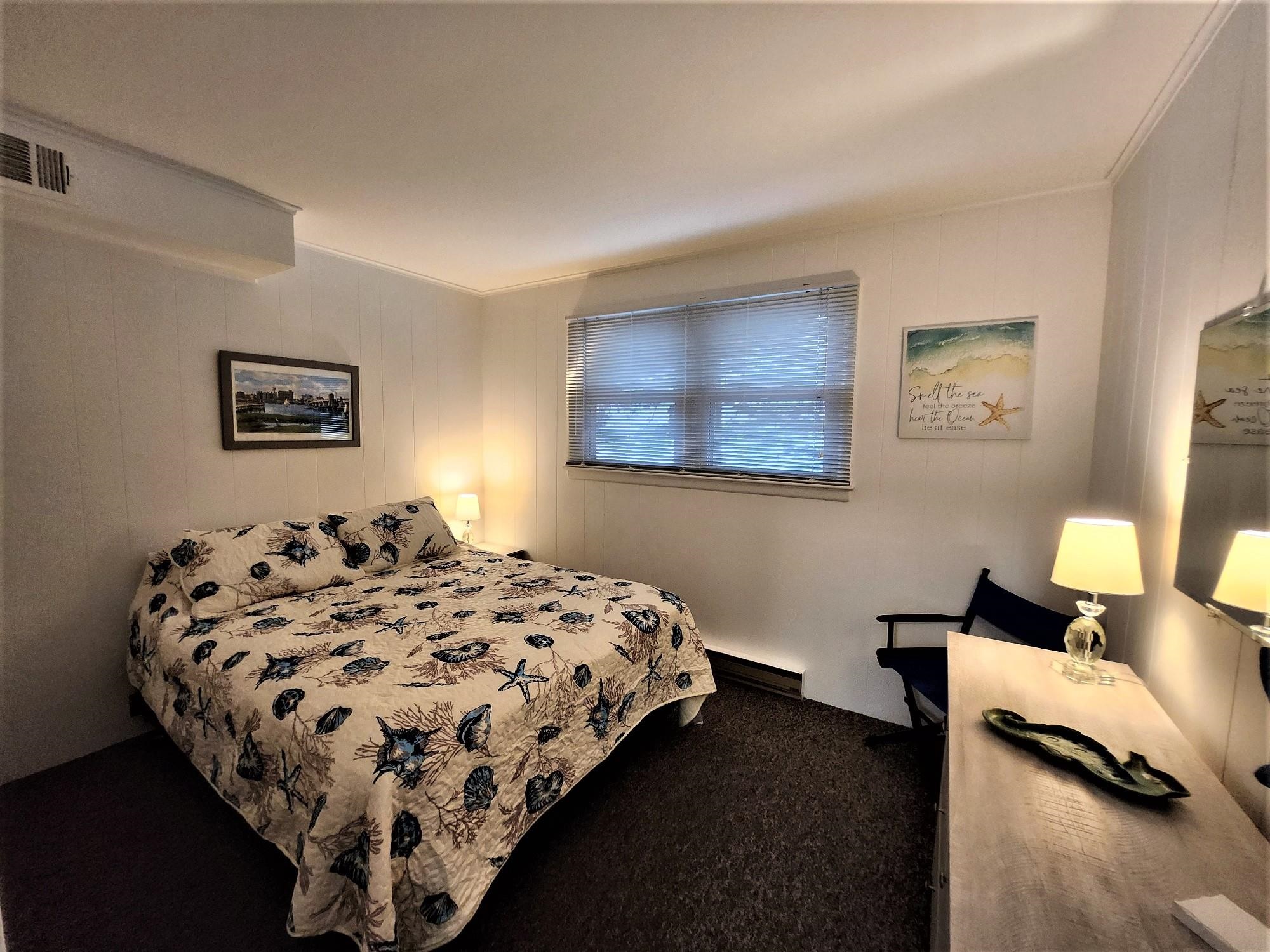 9903 2nd Stone Harbor, NJ 08247 - Photo 11 of 28 a bedroom with bed and a window