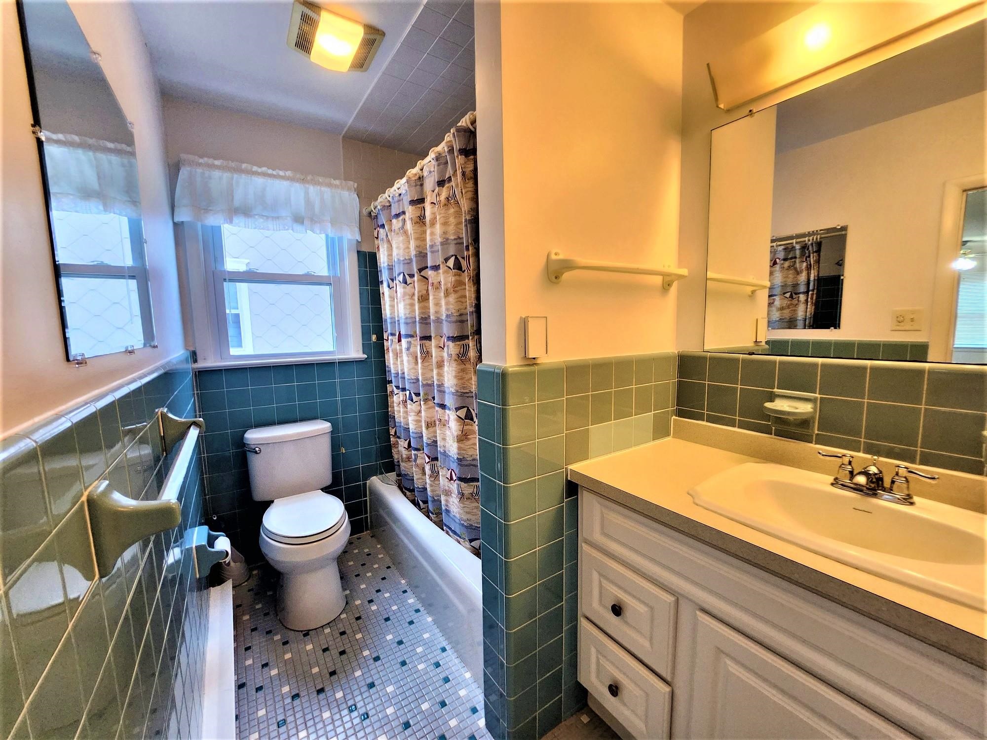 9903 2nd Stone Harbor, NJ 08247 - Photo 13 of 28 a bathroom with a sink toilet and shower